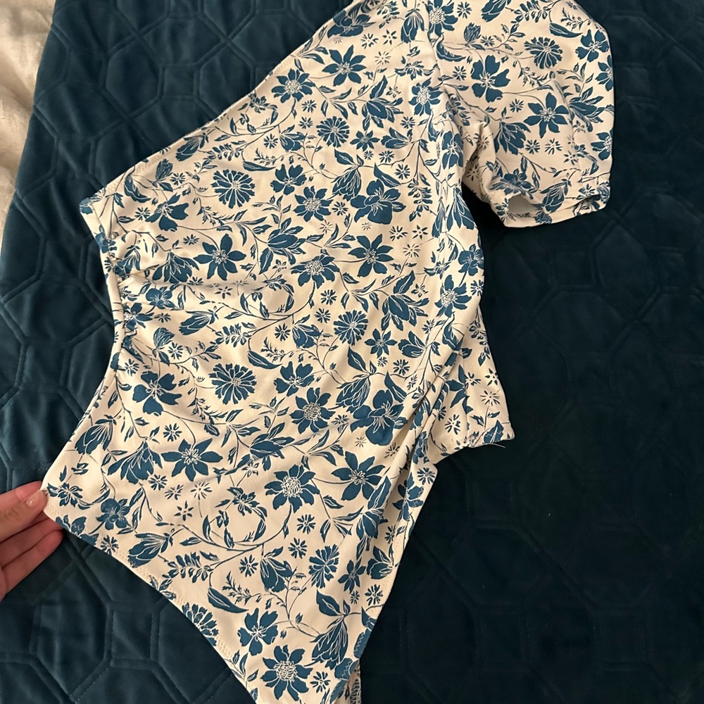 Free People Body Suit. I kept the small. This is so cute I get compliments often